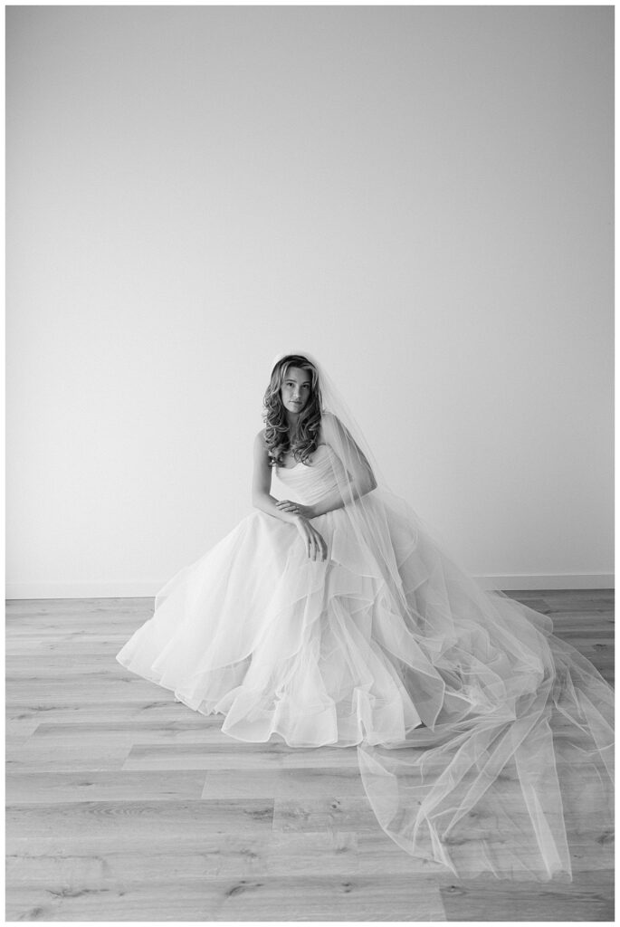 A black and white ultra luxury bridal portrait captured in studio by Rhonda Rowell