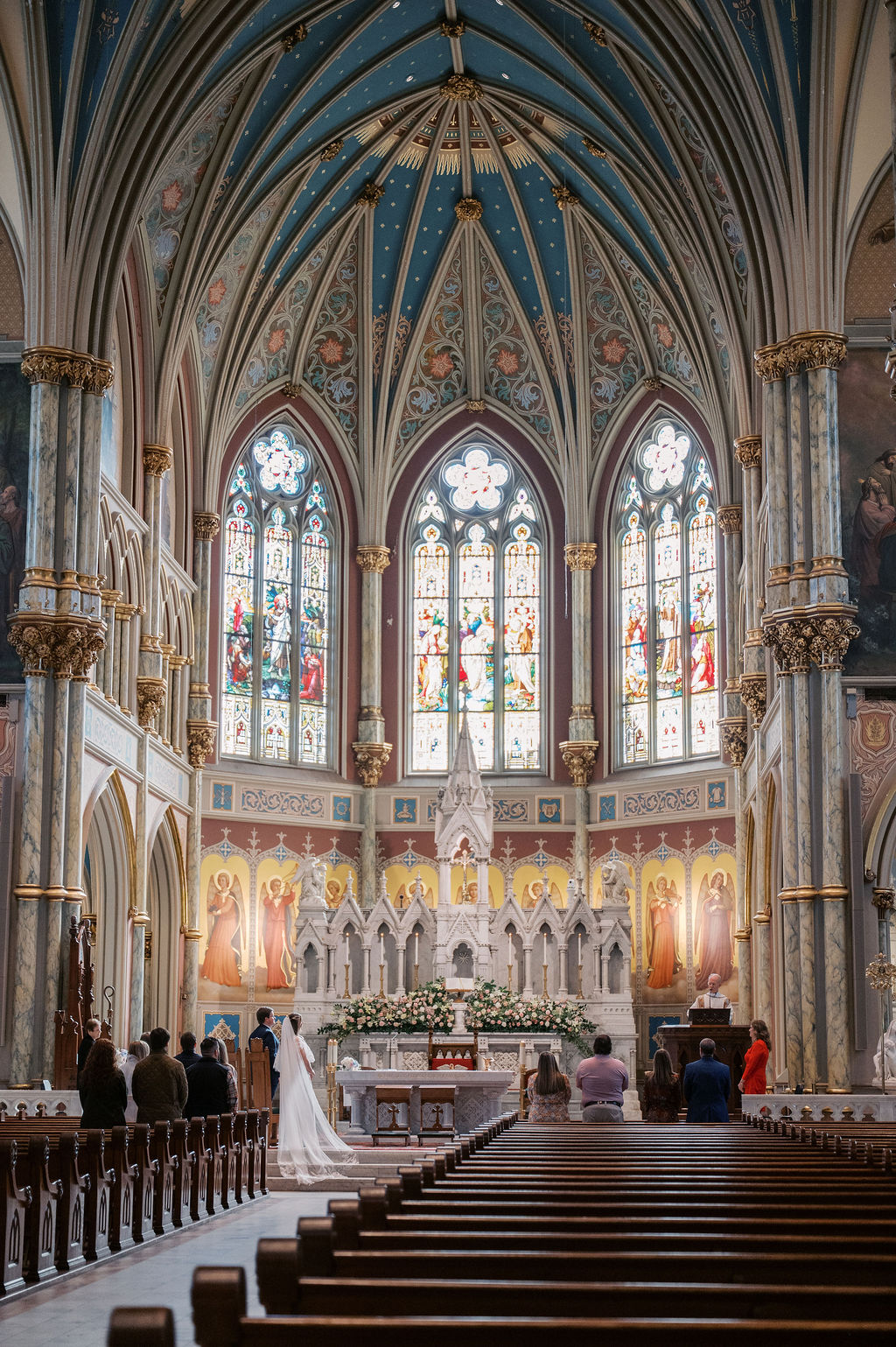 The view of a wedding ceremony at The Cathedral Basilica of St. John The Baptist