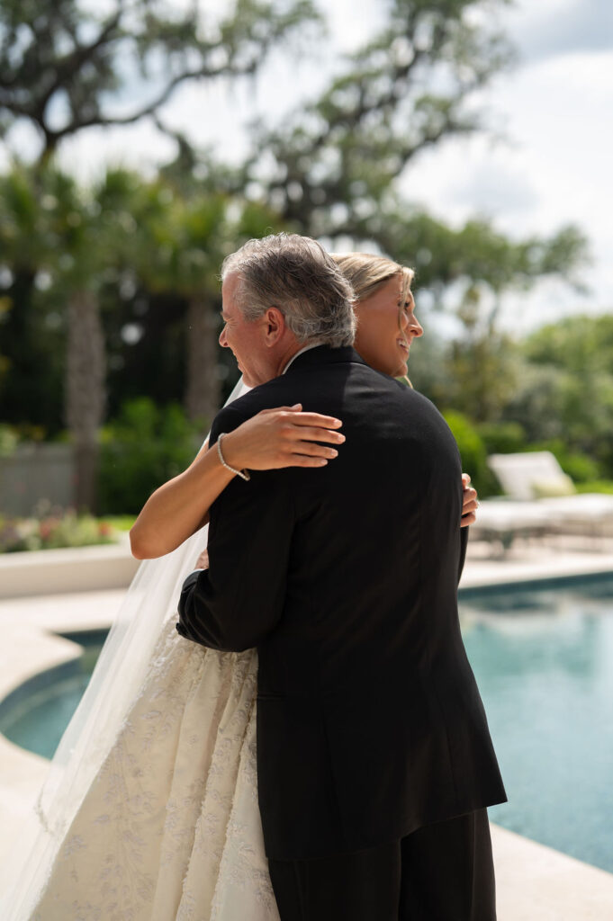 A Sea Island bride's first look with her dad.