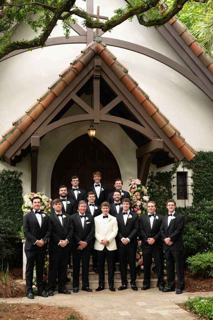A Sea Island groom and groomsmen in front of the Cloister Chapel.