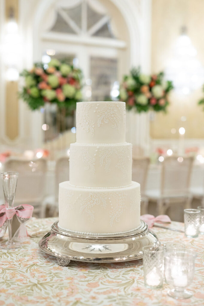 Reception details at a Sea Island wedding reception. Including vibrant florals and colorful place settings.